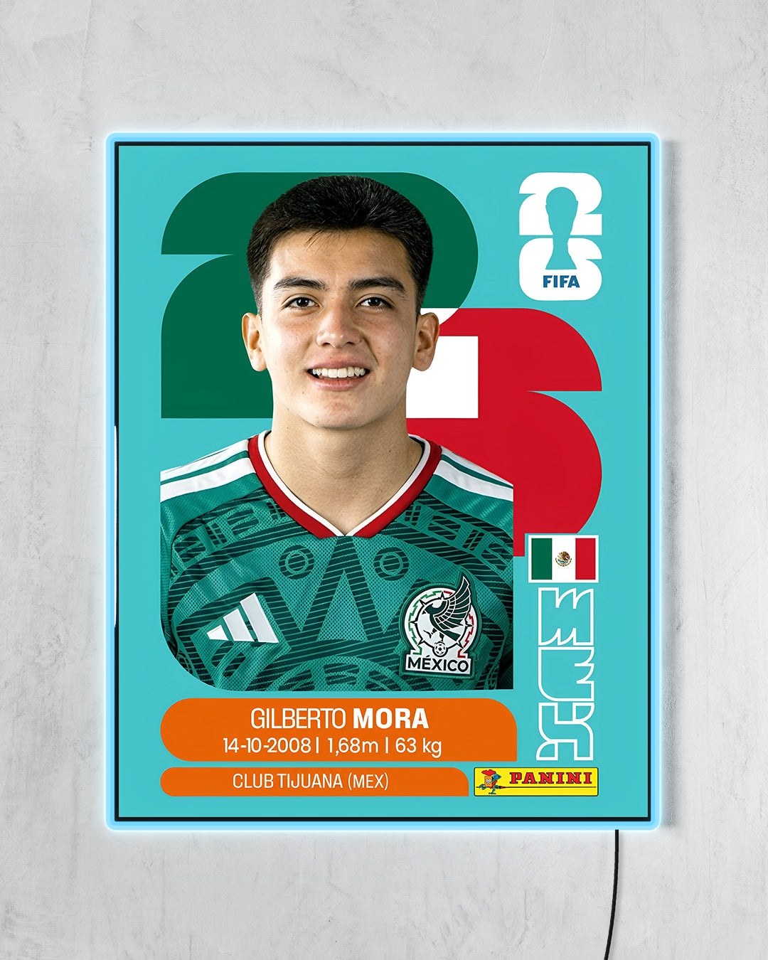 Gilberto Mora - Sticker 2026 con LED celeste encendido
